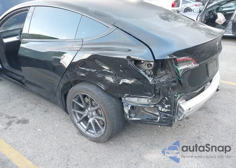 2021 Tesla Model 3 Standard Range Plus Rear-Wheel Drive from USA, damaged, VIN 5YJ3E1EA2MF938613